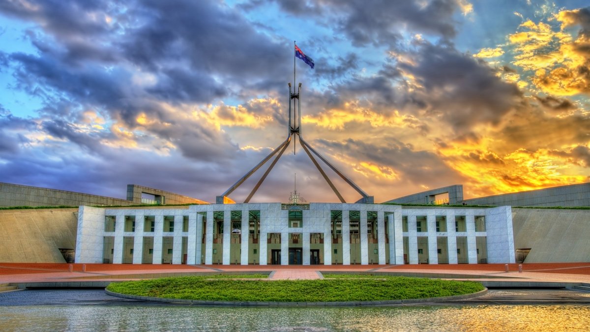 Parliament House, Canberra with a flag on top