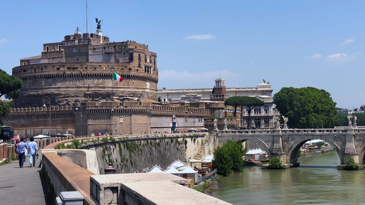 a castle with Castel Sant'Angelo over water