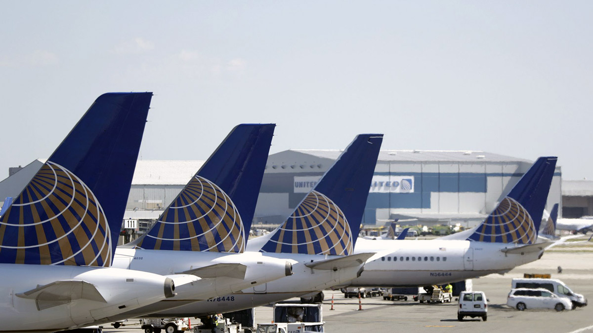 airplanes parked at an airport