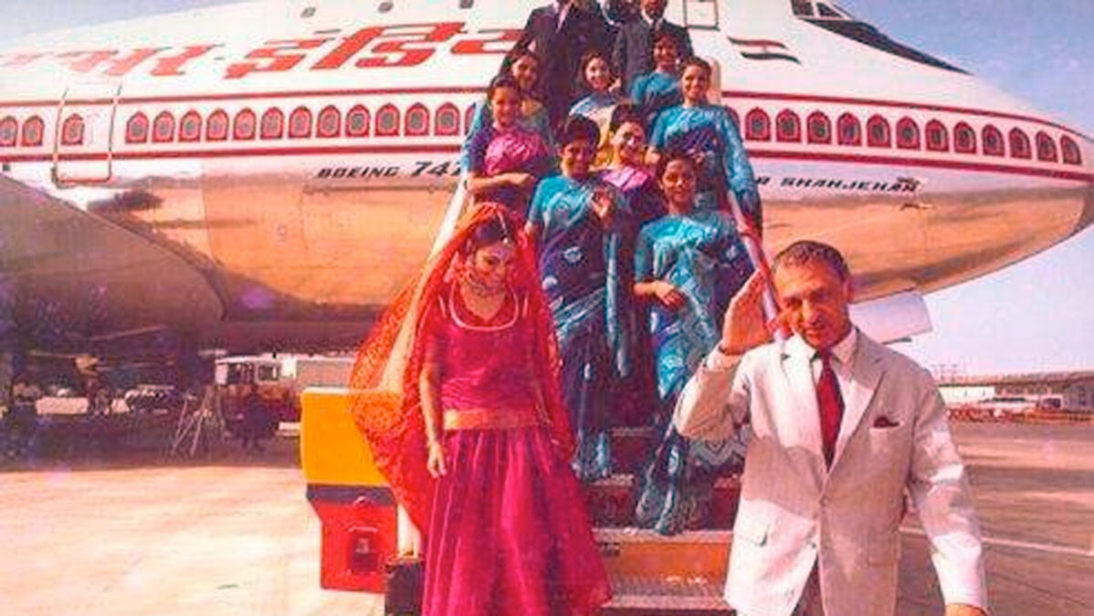 a group of people standing on a plane