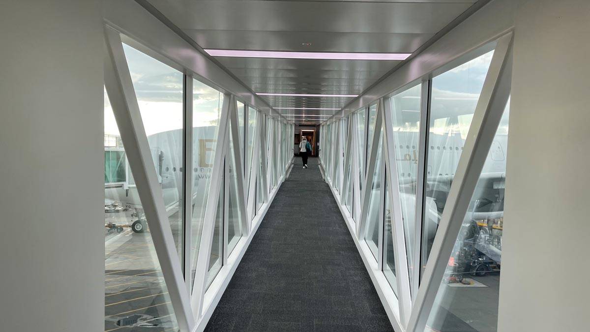 a long hallway with glass windows