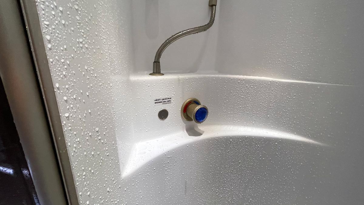 a shower with water drops on it