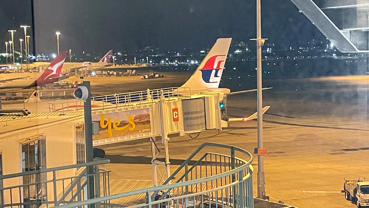 an airplane on a runway at night