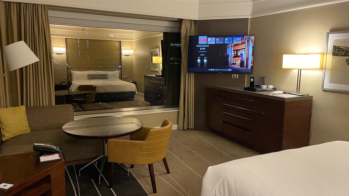 a room with a television and a bed