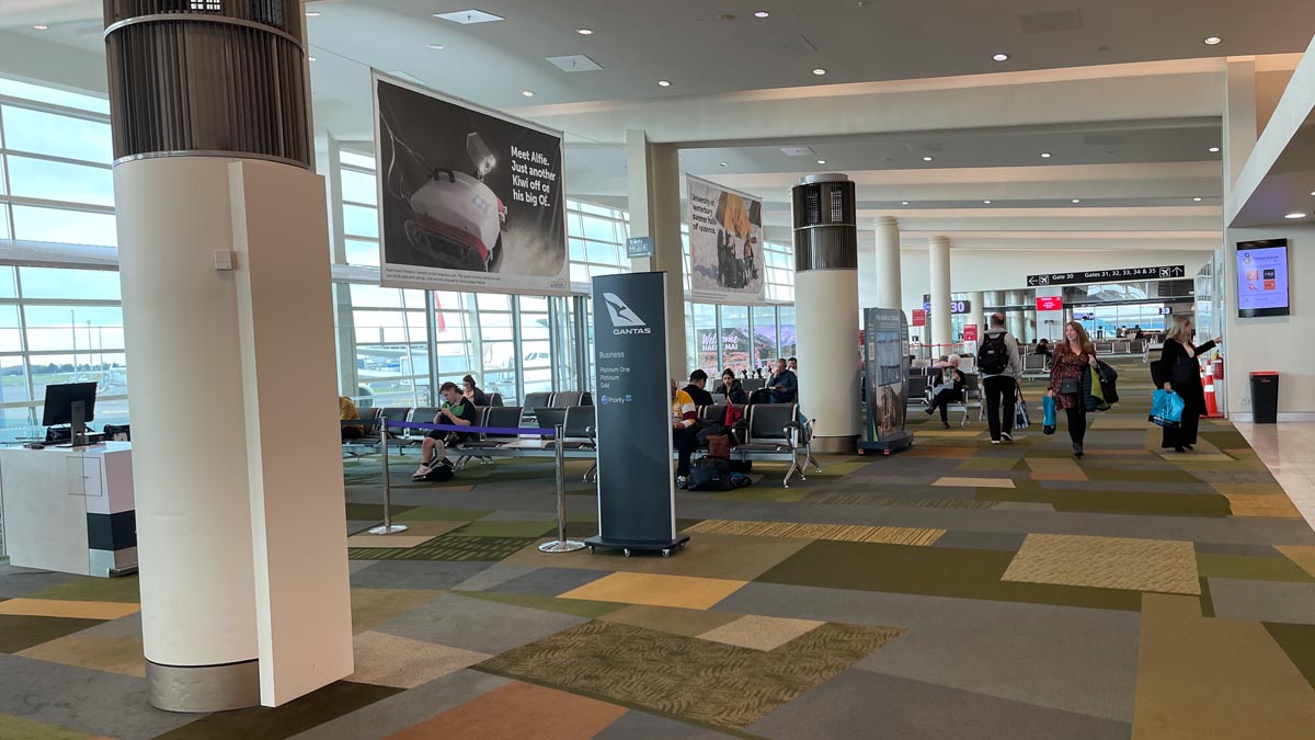 people sitting in an airport terminal