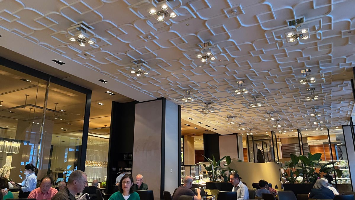 a group of people sitting in a restaurant