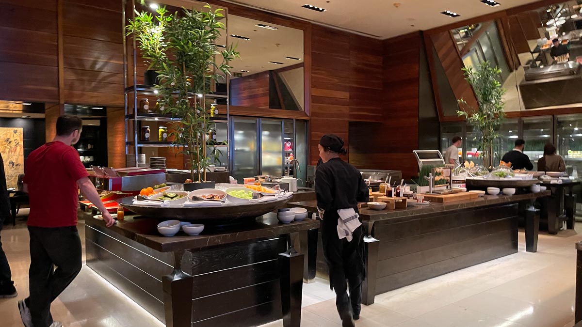 a woman standing in a restaurant