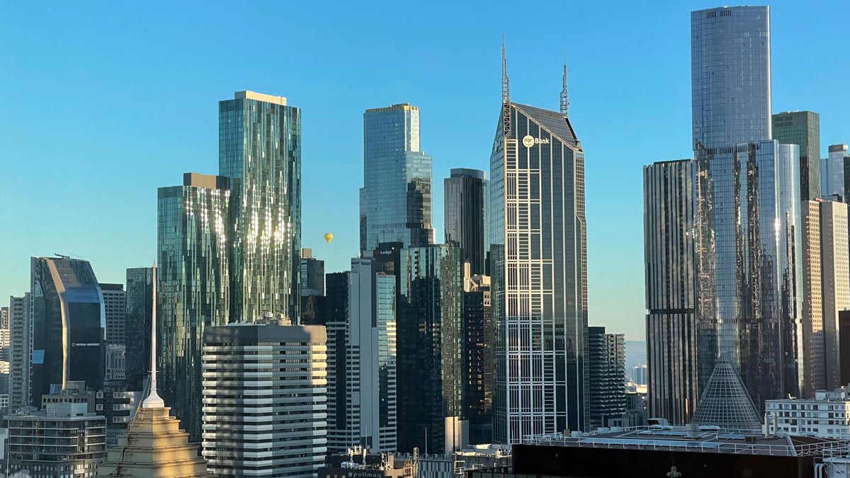 a city skyline with tall buildings