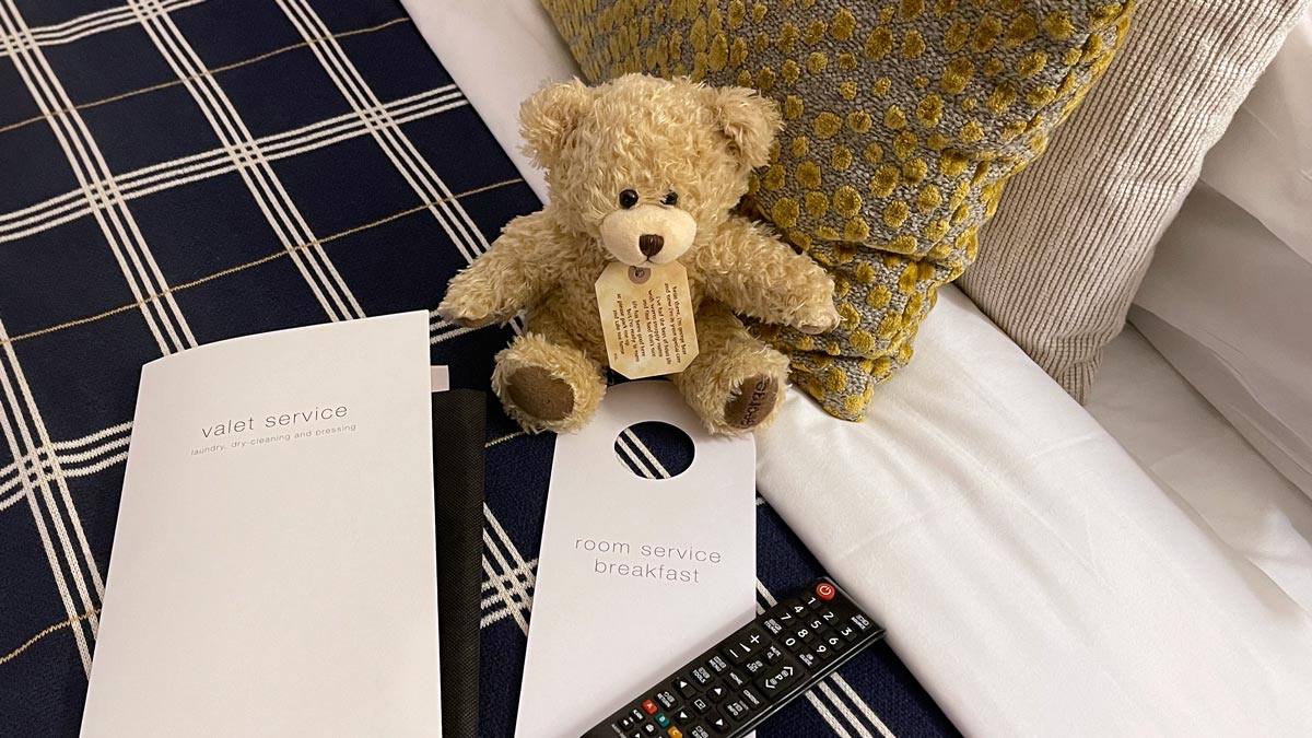 a teddy bear on a bed