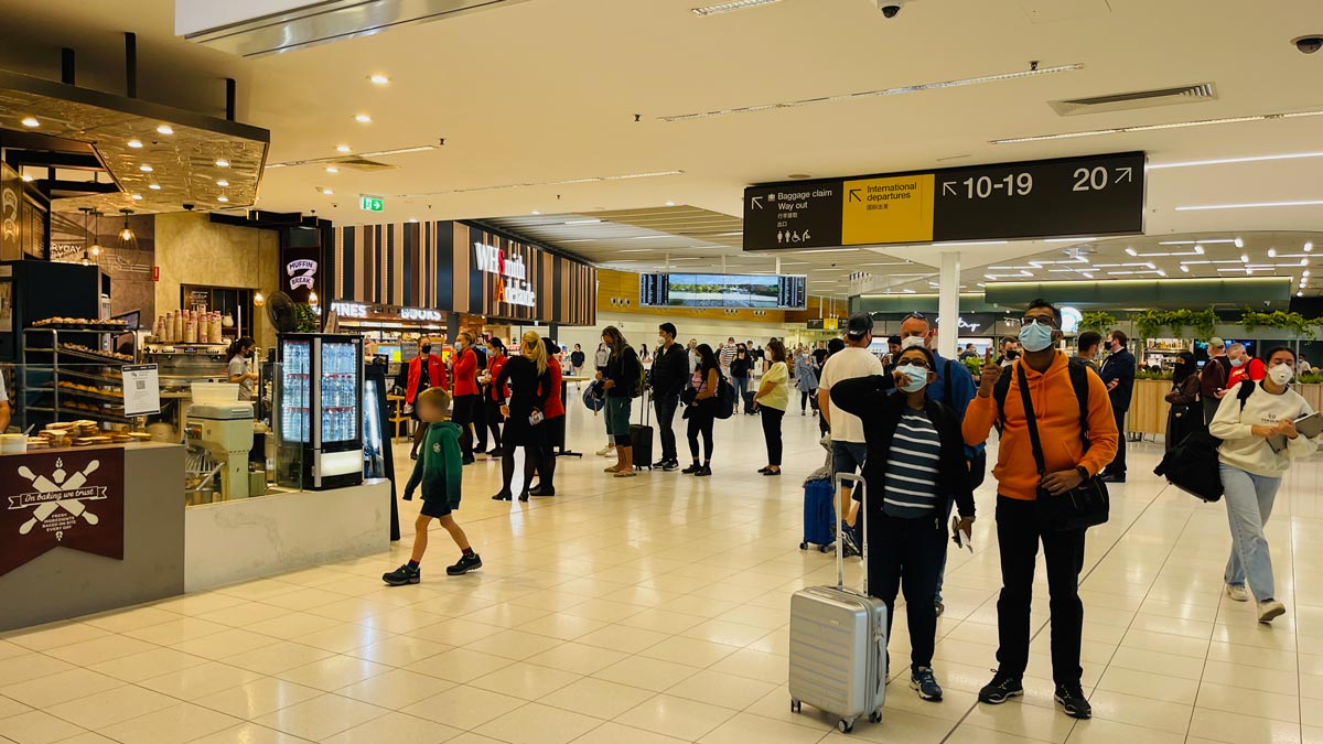 a group of people in a terminal