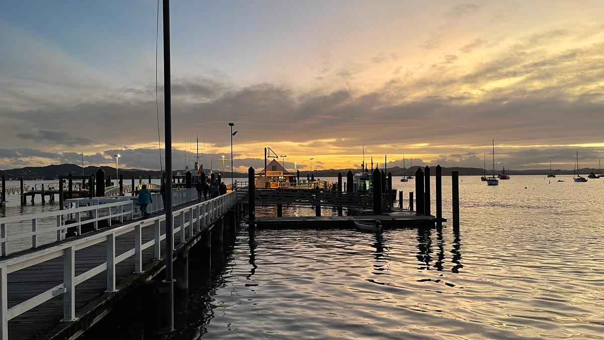 a dock with people walking on it