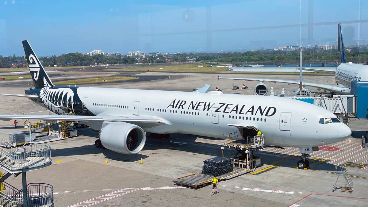 a large white airplane on a runway