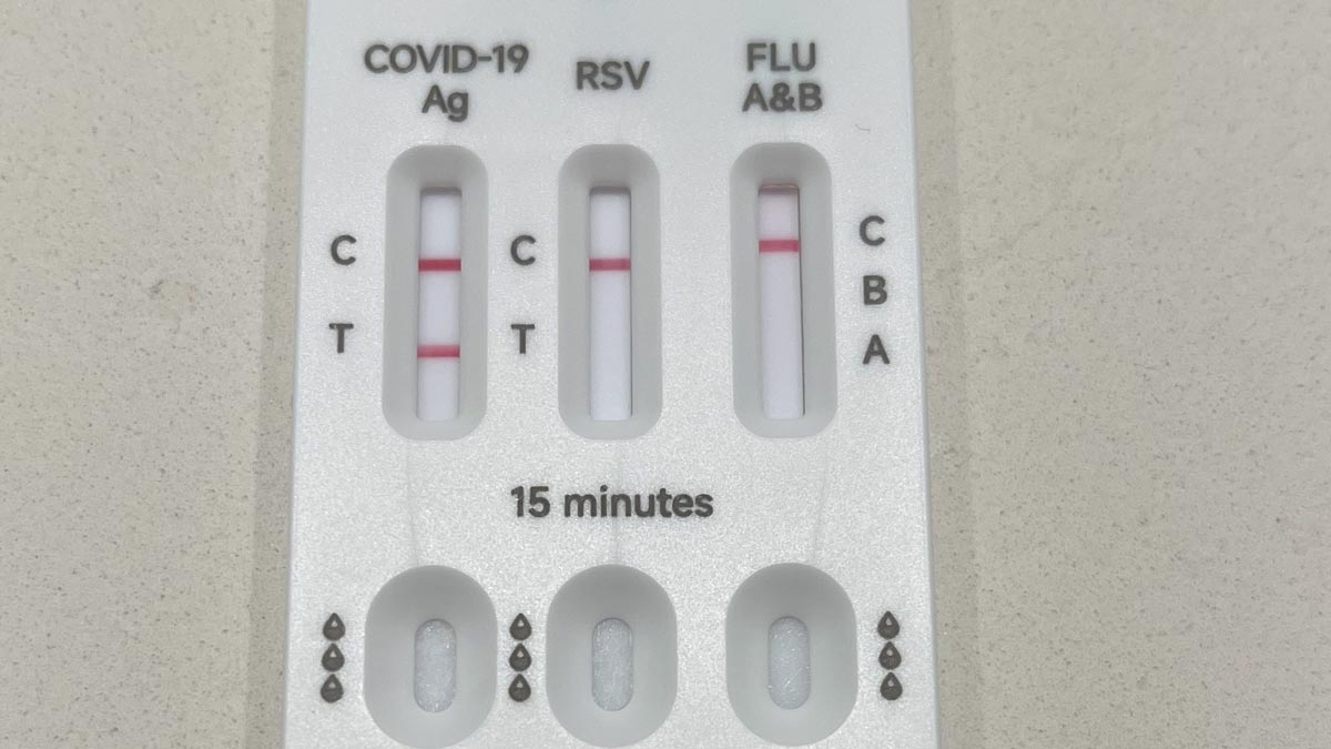 a white rectangular device with red lines