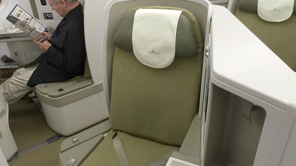 a seat with a white towel on it