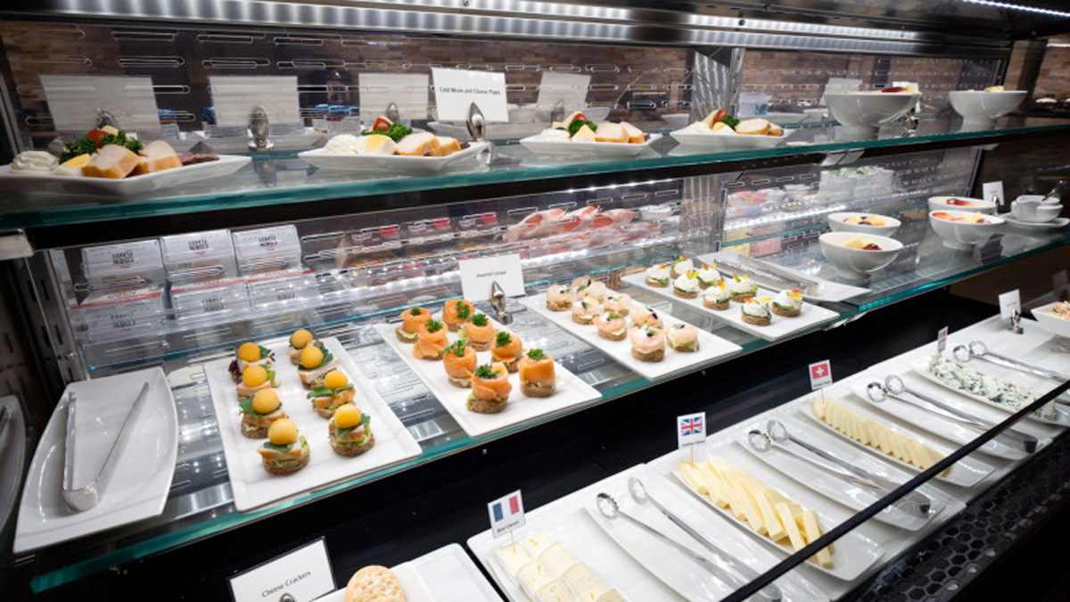 a display case with different food items on it